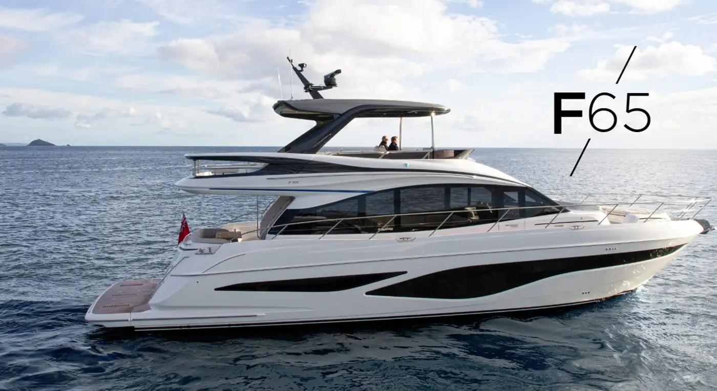 Sleek and modern yacht Princess F65 sailing on open waters with two people on the upper deck enjoying the view.